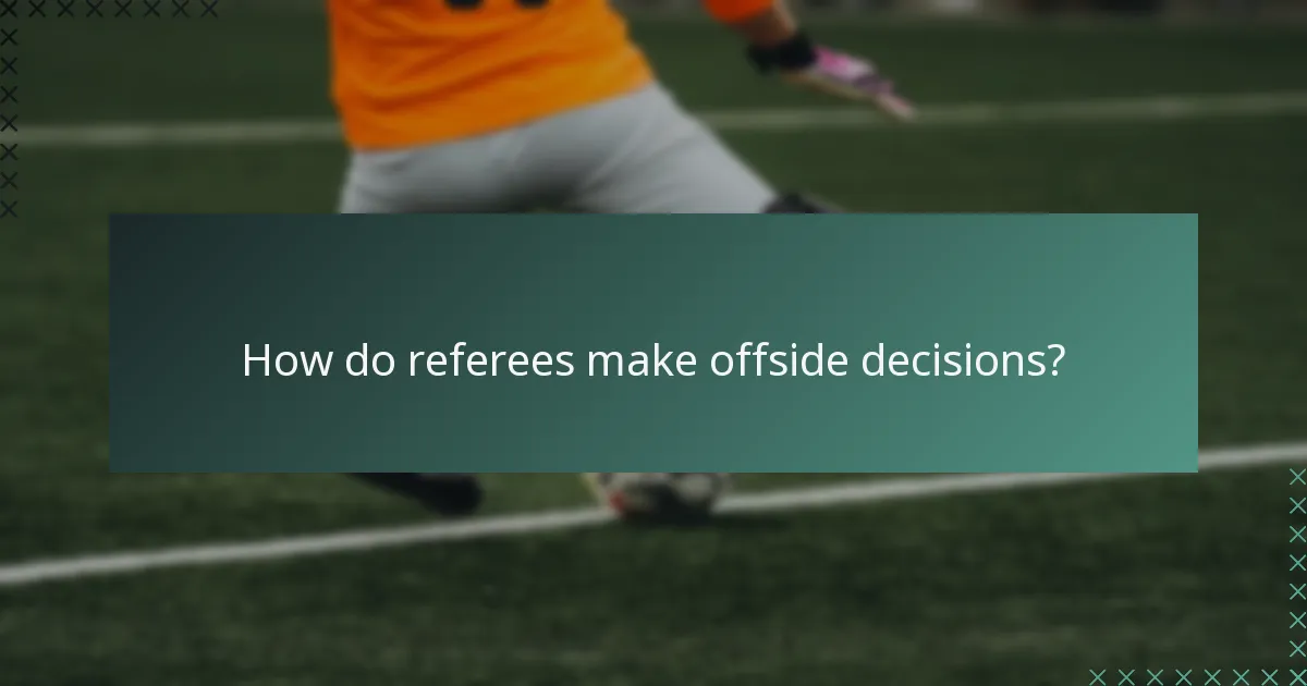 How do referees make offside decisions?